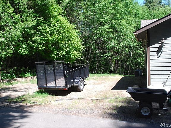 Got an RV or boat.  Now you have parking for them.  Don't forget the full circular driveway that will make parking a breeze. 