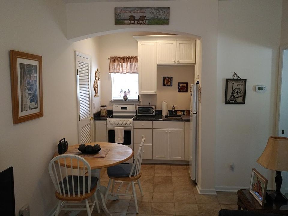 From front door facing kitchen
