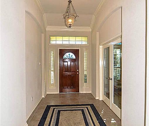 Extended tiled entry.