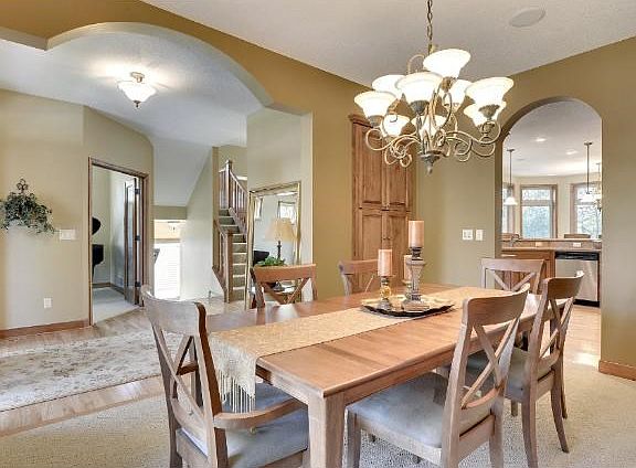 The formal dining room greets you as you walk through the entry of the home.
