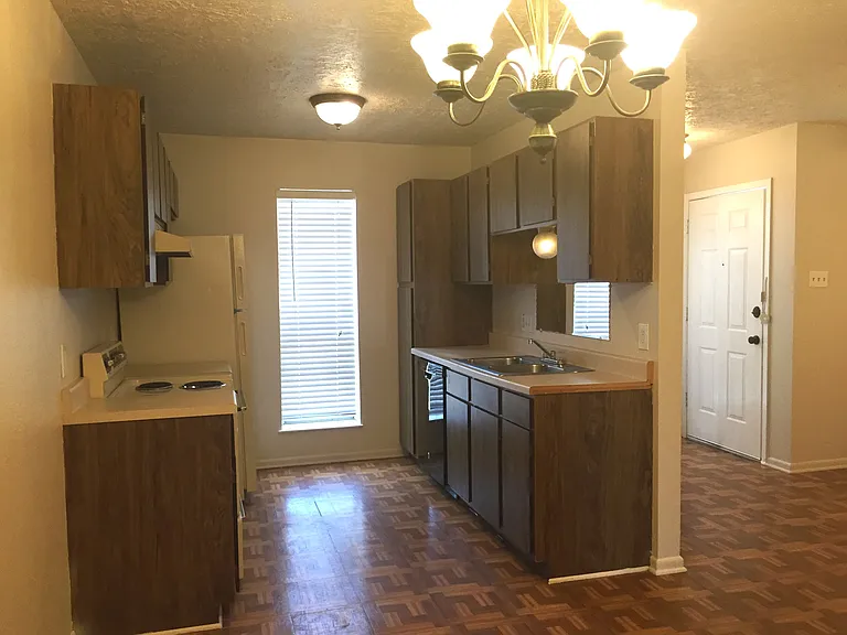 Because both units are being renovated with white cabinets, countertops, flooring, appliances and paint this just shows the layout of the kitchen.