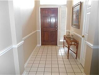 Spacious, tiled entry leads you into this open floor plan.