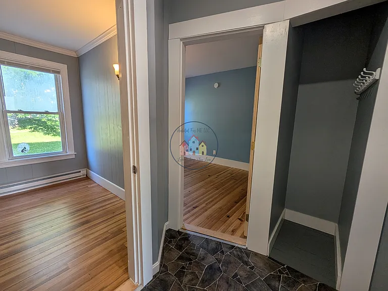 Hall to bedrooms with small storage