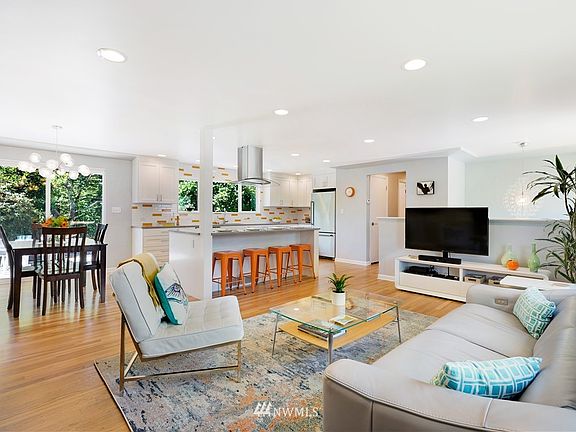 Open floorplan with wonderful flow in the main living areas. You will see the $150,000 Seller upgrades the moment you walk in. The attention to detail is at every turn.