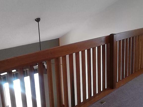 loft with catherdal ceiling