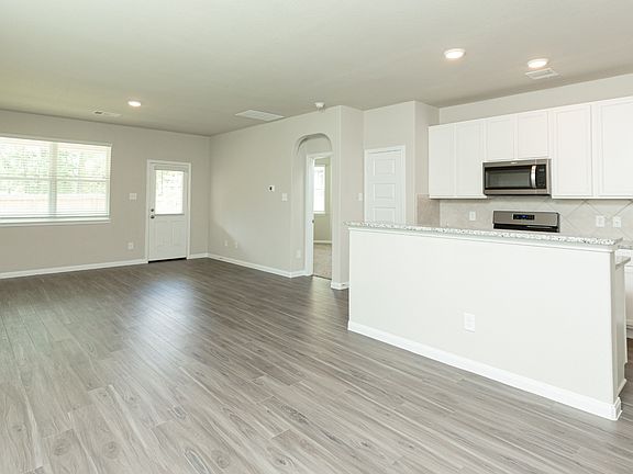 Dining Area to Kitchen and Family Room