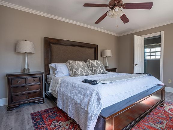 Large master bedroom with plenty of room for a king size bed. Walk in closet and en suite bathroom.