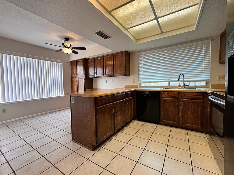 Open kitchen with eat-in family dining and lots of storage