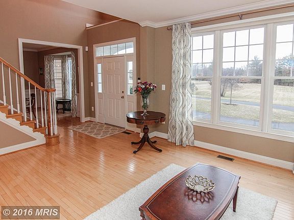 View of foyer & front yard from living room