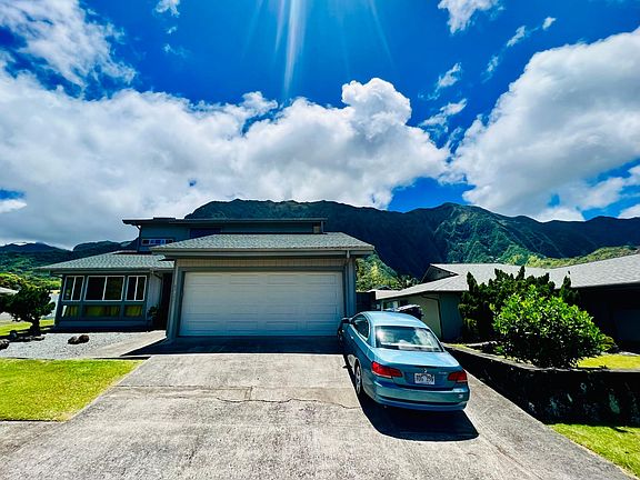 Three car driveway; two car garage with attic. Corner property. Private street and neighborhood.