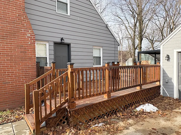 Beautiful deck with latched gates at both ends.