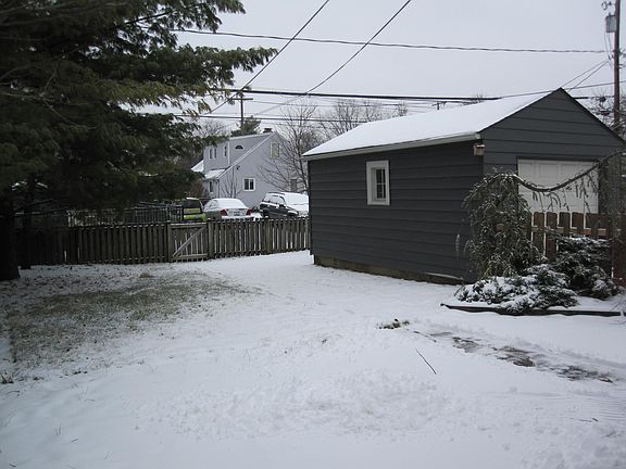 Fenced backyard and flagstone patio