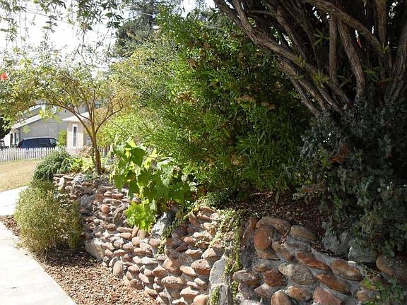 Stone wall and sidewalk