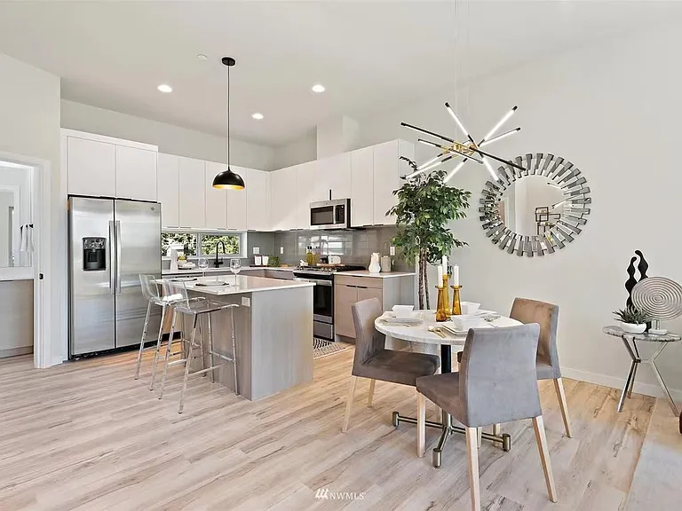 Soaring 11' high ceilings + spacious kitchen