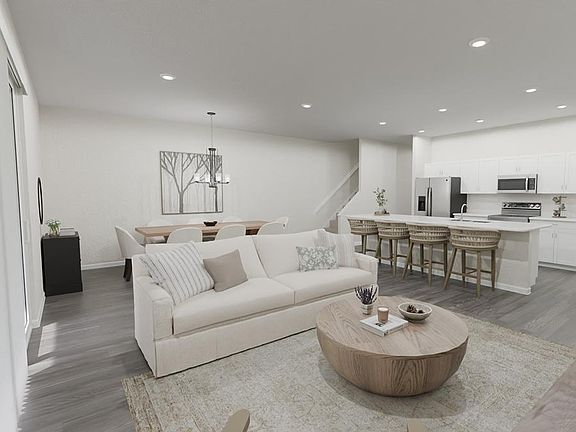 Downstairs, enjoy a spacious, open living area Artist s rendering