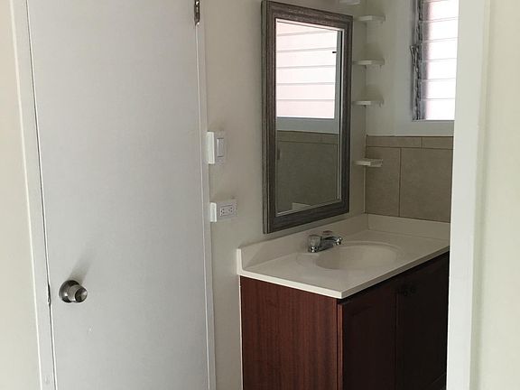 Bathroom - vanity and linen closet area