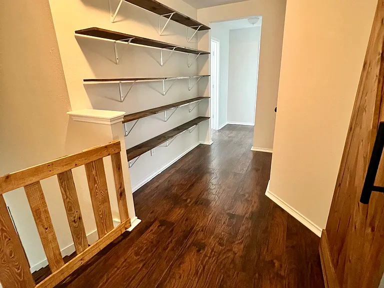 Hallway to 3 additional upstairs rooms