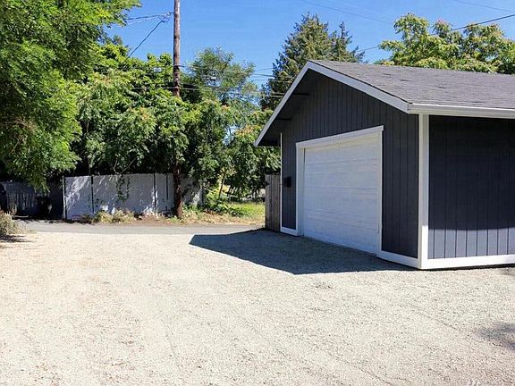 Detached garage. Plenty of off-street parking. Access to bac