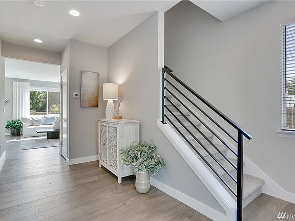 Photos of a 2337 plan built at another community. Details will vary