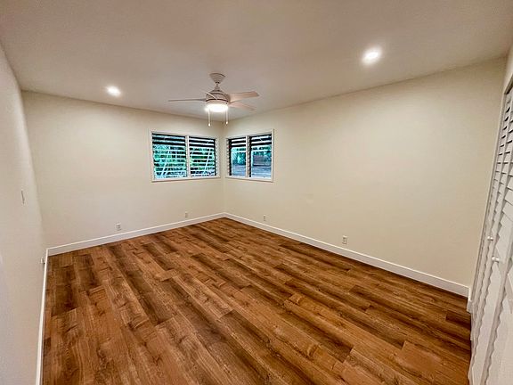 Bedrooms have new Lifeproof flooring, doors, light fixtures and paint.