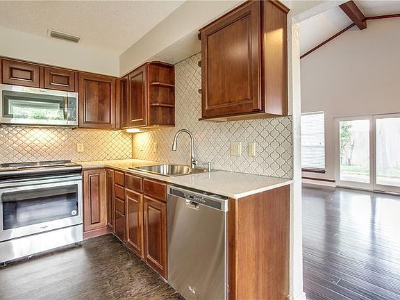Fresh kitchen next to the marvelous family room.