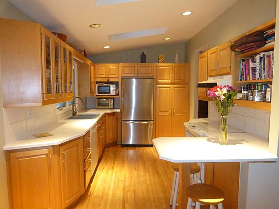 light-filled kitchen with newer appliances