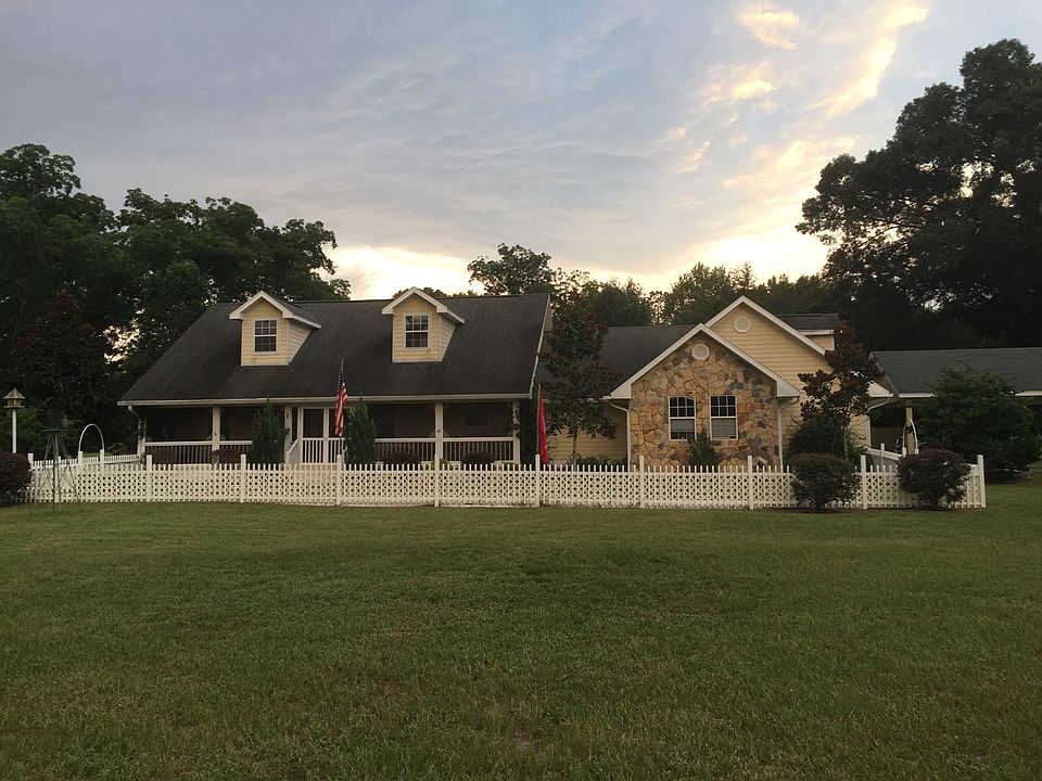 4 br, 3 1/2 baths on 5.08 ac