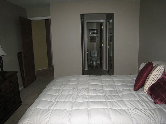 Bedroom, facing in from windows.