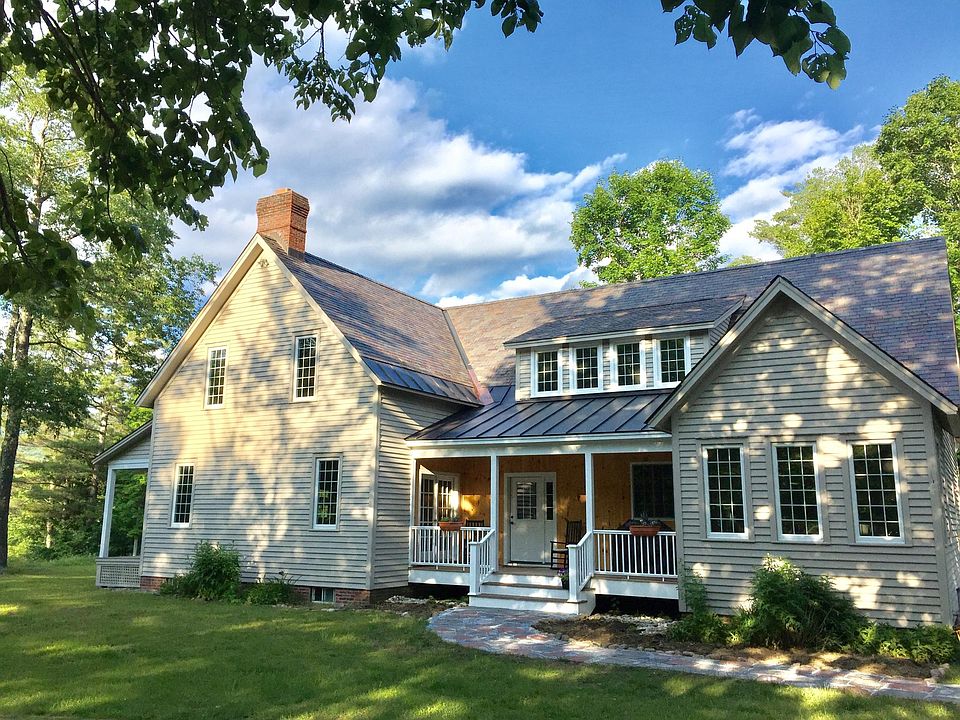 Very private setting with 2 porches- one facing the pond and one the side yard