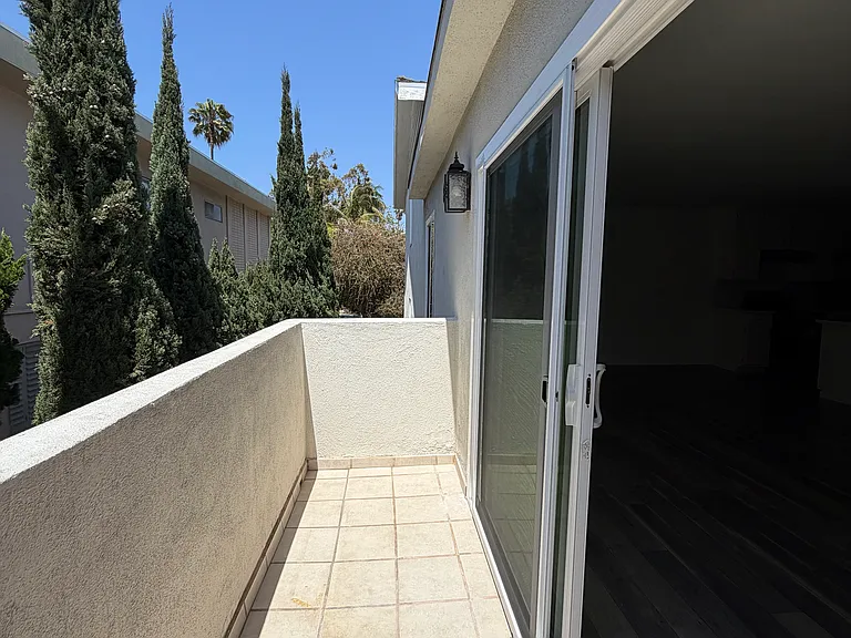 Balcony next to living room.