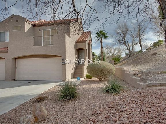 Exterior Front features desert landscaping with double deep driveway.