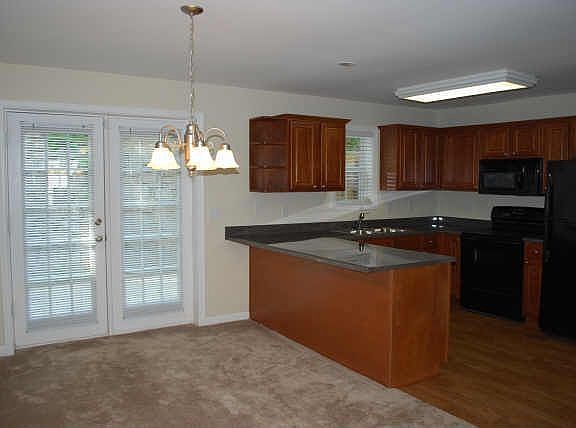 Open, Large Kitchen with a Ton of Counter Space and Kitchen Cabinets