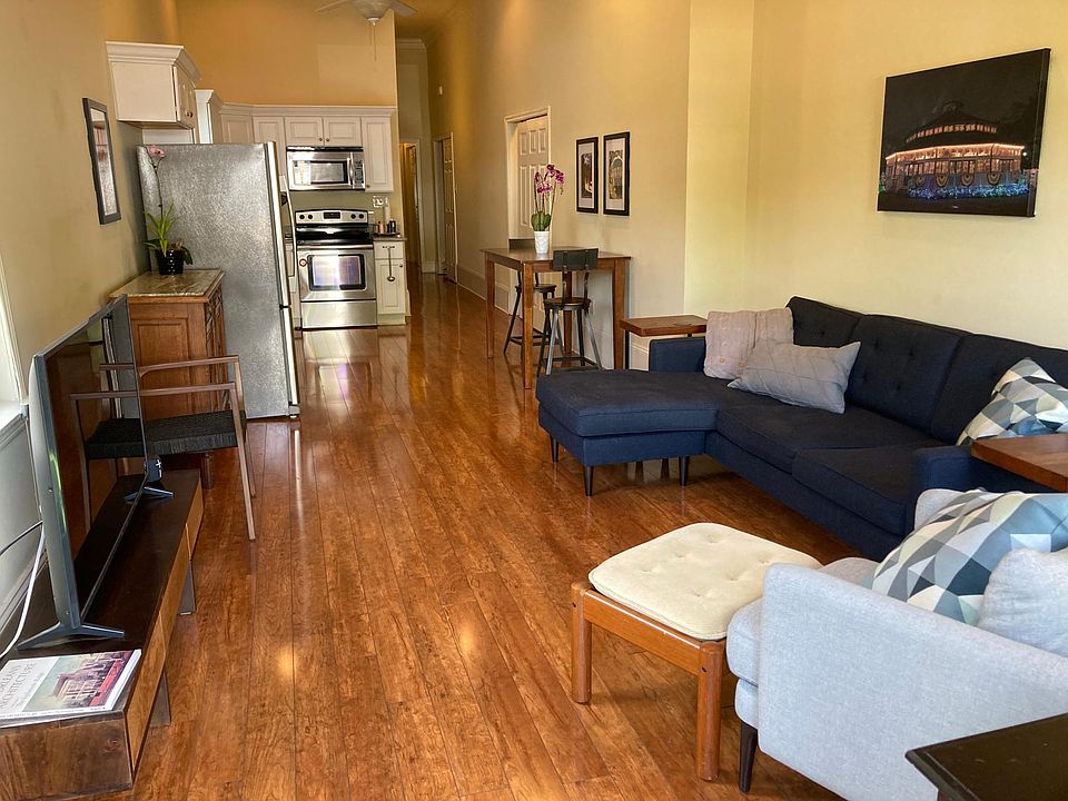 This is a renovated shotgun with the kitchen moved towards the front of the house and a hallway to the bedrooms and bathrooms (in unrenovated shotguns, you typically have to walk through the first bedroom to get to the second bedroom and then through the