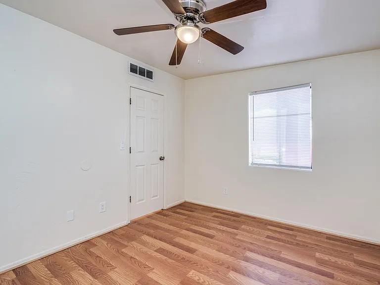 Bedroom 2 Entry to opposite hallway leading to shared bathroom