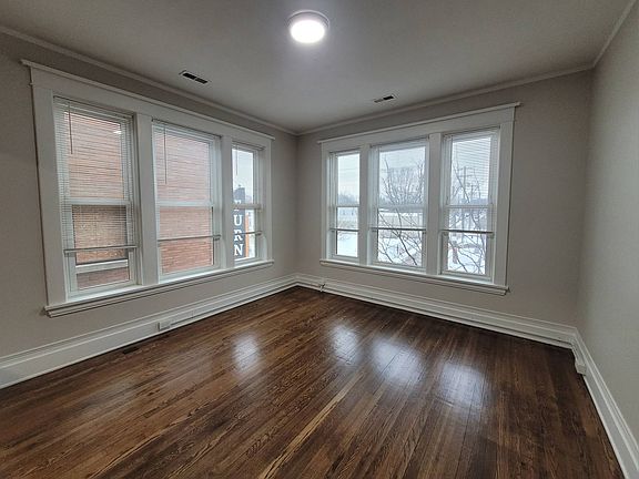 Large windows within open concept living spaces, Leonard frontage
