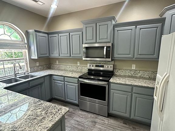 5th image of 1513 NW Belle Royal Ct