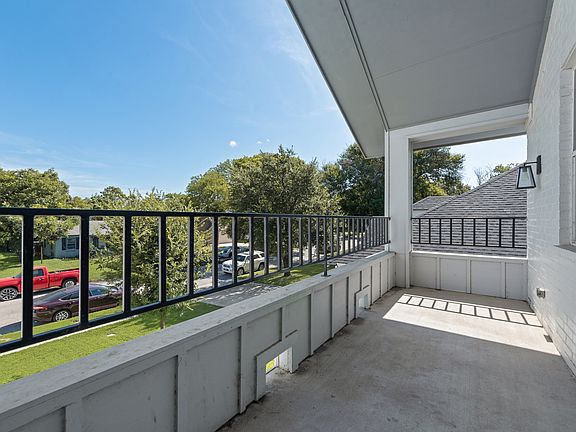 2nd floor balcony on front of house