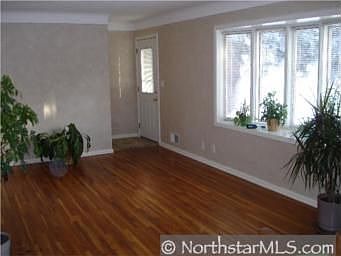 Hardwood floors greet you when you enter this beautiful home