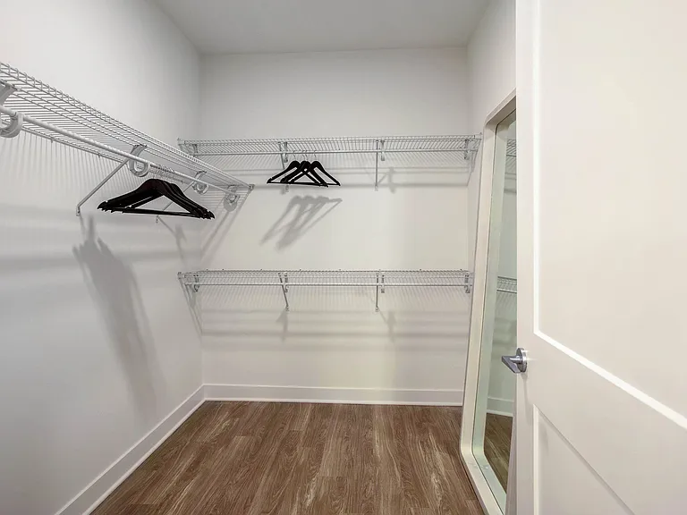 This walk-in closet is ready for your wardrobe goals.