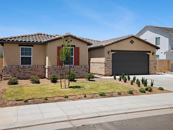 Front view with Two Car Garage (insulated) and 3 car driveway