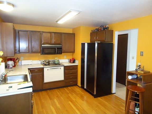 Kitchen with slider to the backyard~lots of storage and counter space