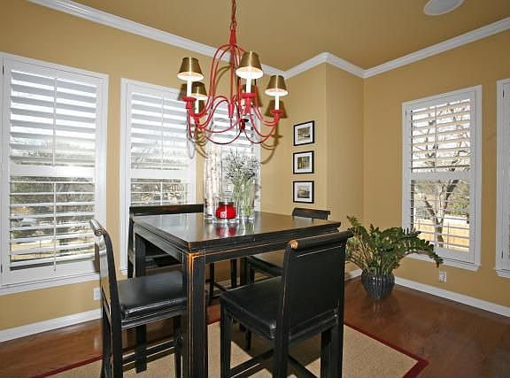 Warm deco paint, crown molding and custom shutters!