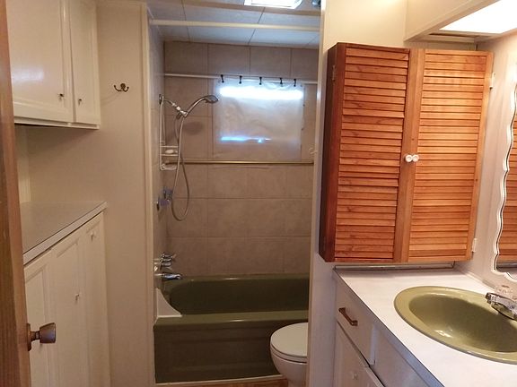 Full bathroom with tub