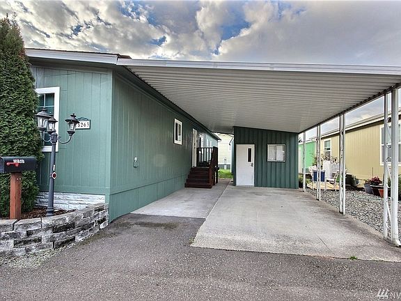 The two car carport helps you get out of your car and into your home without getting wet in our Seattle weather.