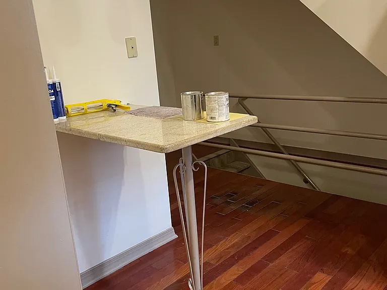 Kitchen table and steps to lower level