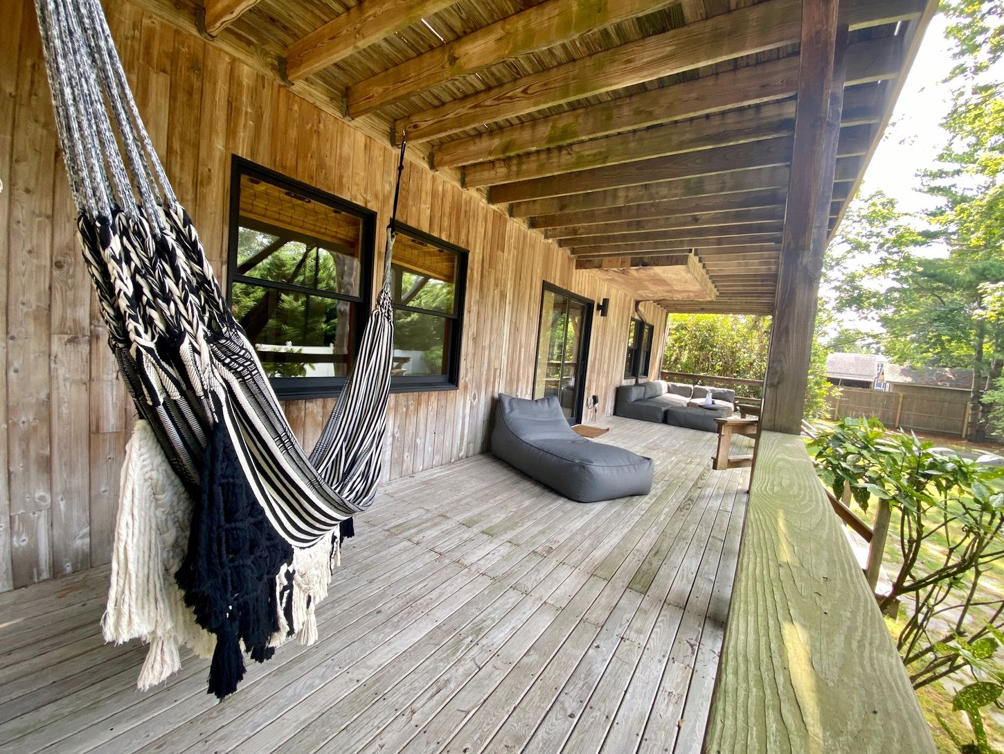 Downstairs Deck with Hammock and Seating Area