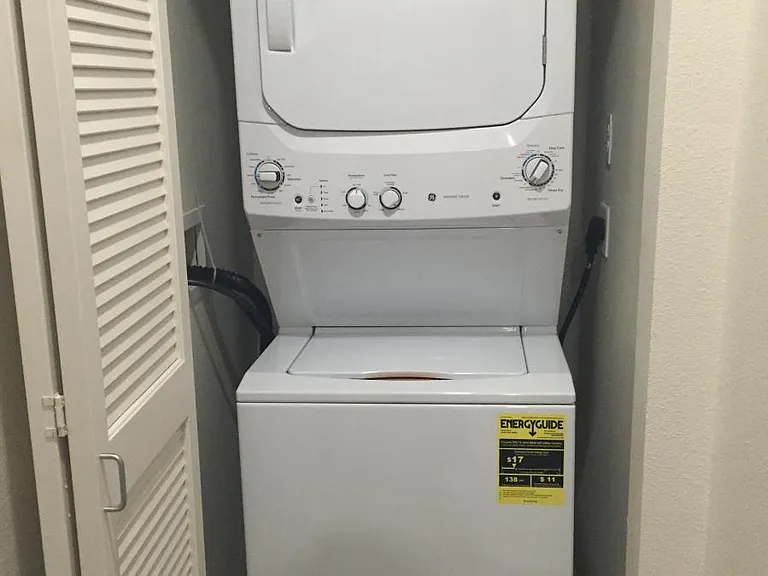 Washer and dryer inside the unit