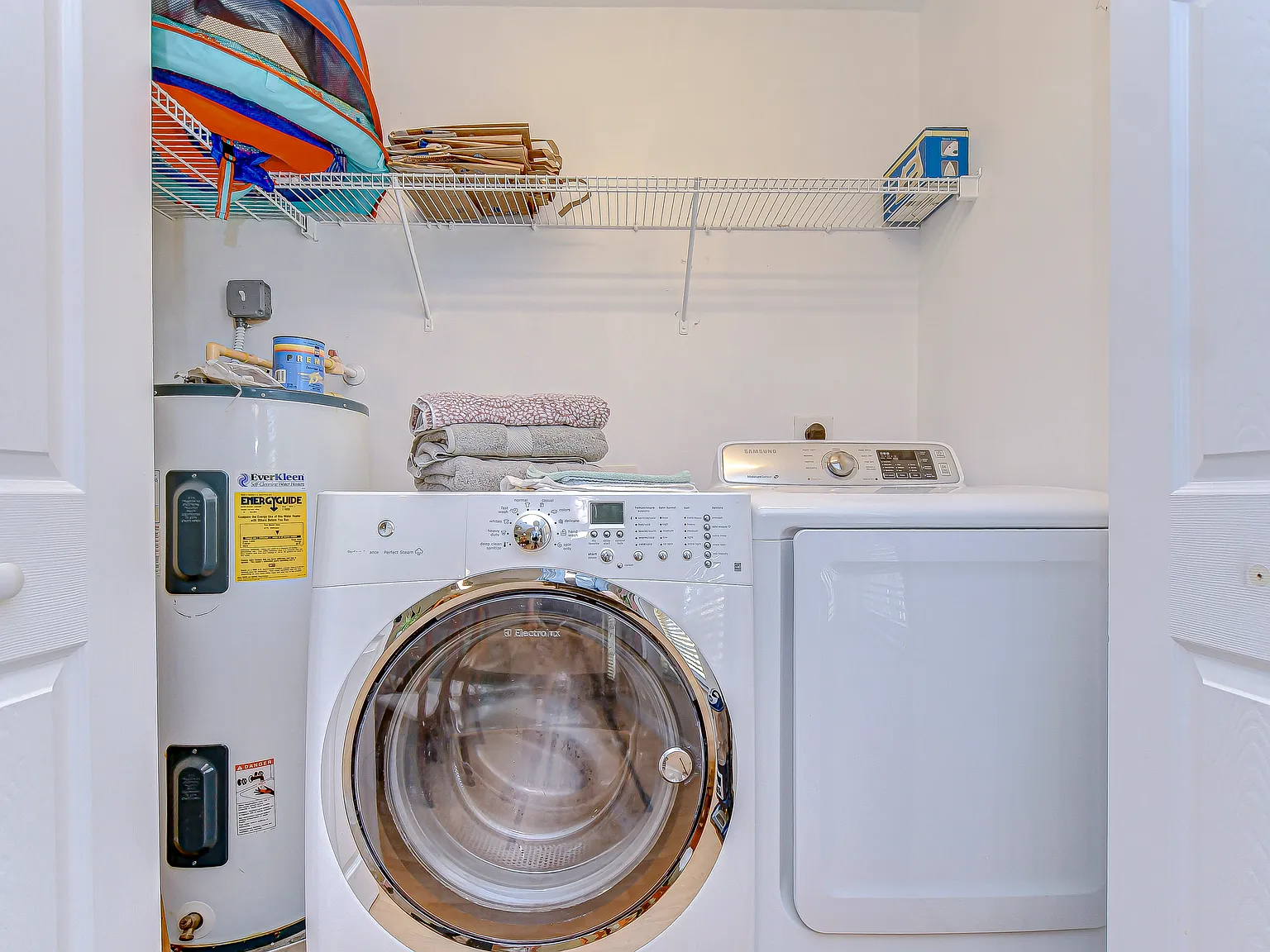 Washer and dryer are located just off the kitchen area