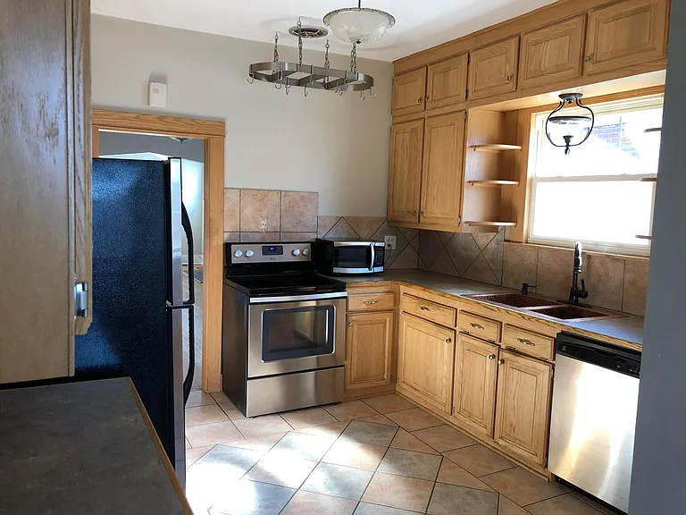 Kitchen with stainless appliances.