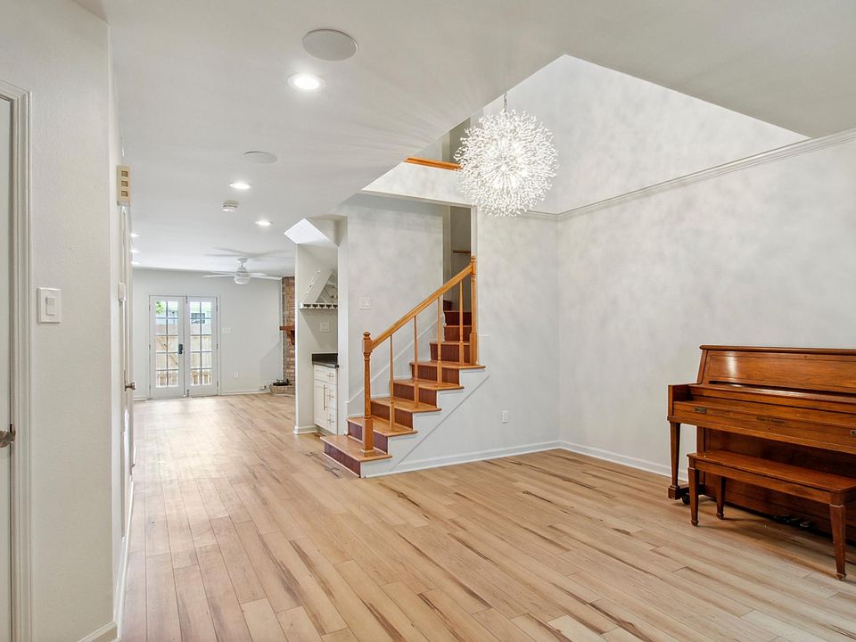 Front Foyer, Dining Area looking towards the Den and backyard.